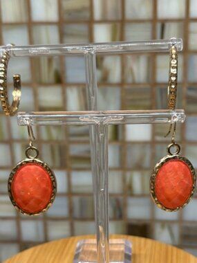 2 Pair of Earrings. Both are gold color.